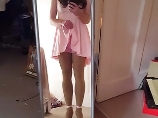 sissy in pink dress posing