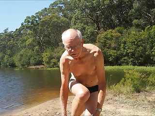Beach old man skinny dips